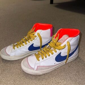 Nike High-Top Sneakers with Blue Swoosh and Yellow Laces